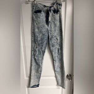 Women's/Juniors size 13 acid wash jeans with light rips.